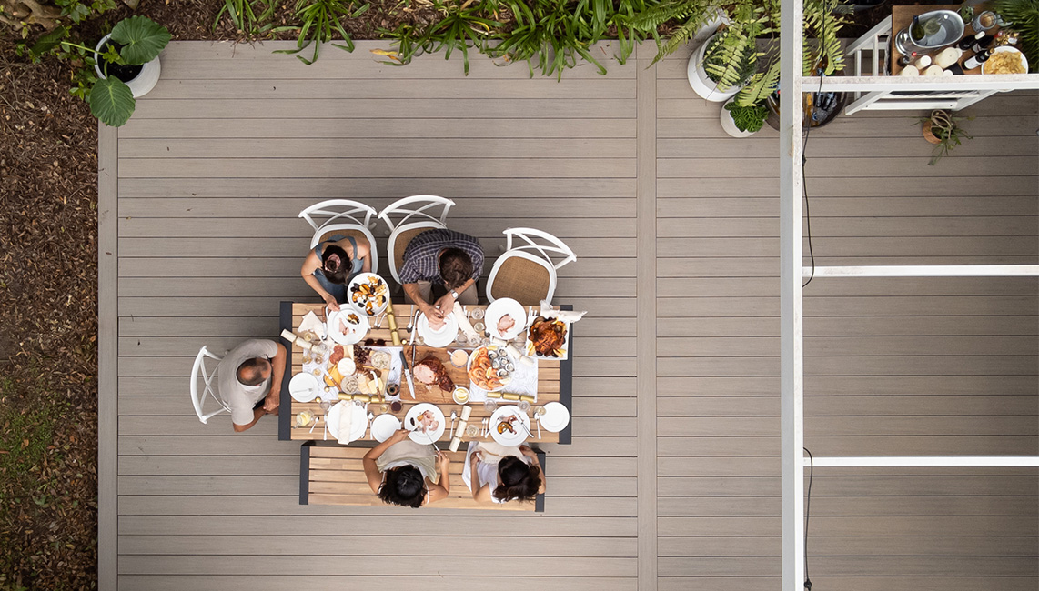 An aerial view of a composite decking group at a table.